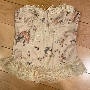 This is a beautiful crème lace corset, originally from Retro Fairy.